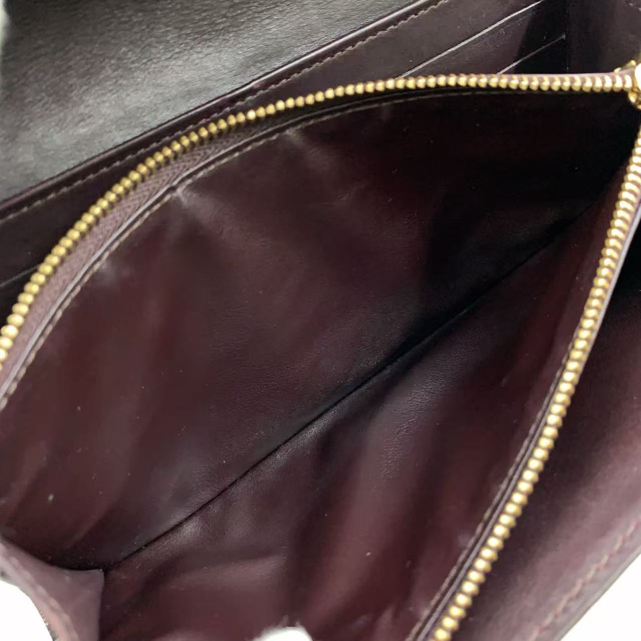 LOUIS VUITTON VERNIS SARAH WALLET IN AMARANTE