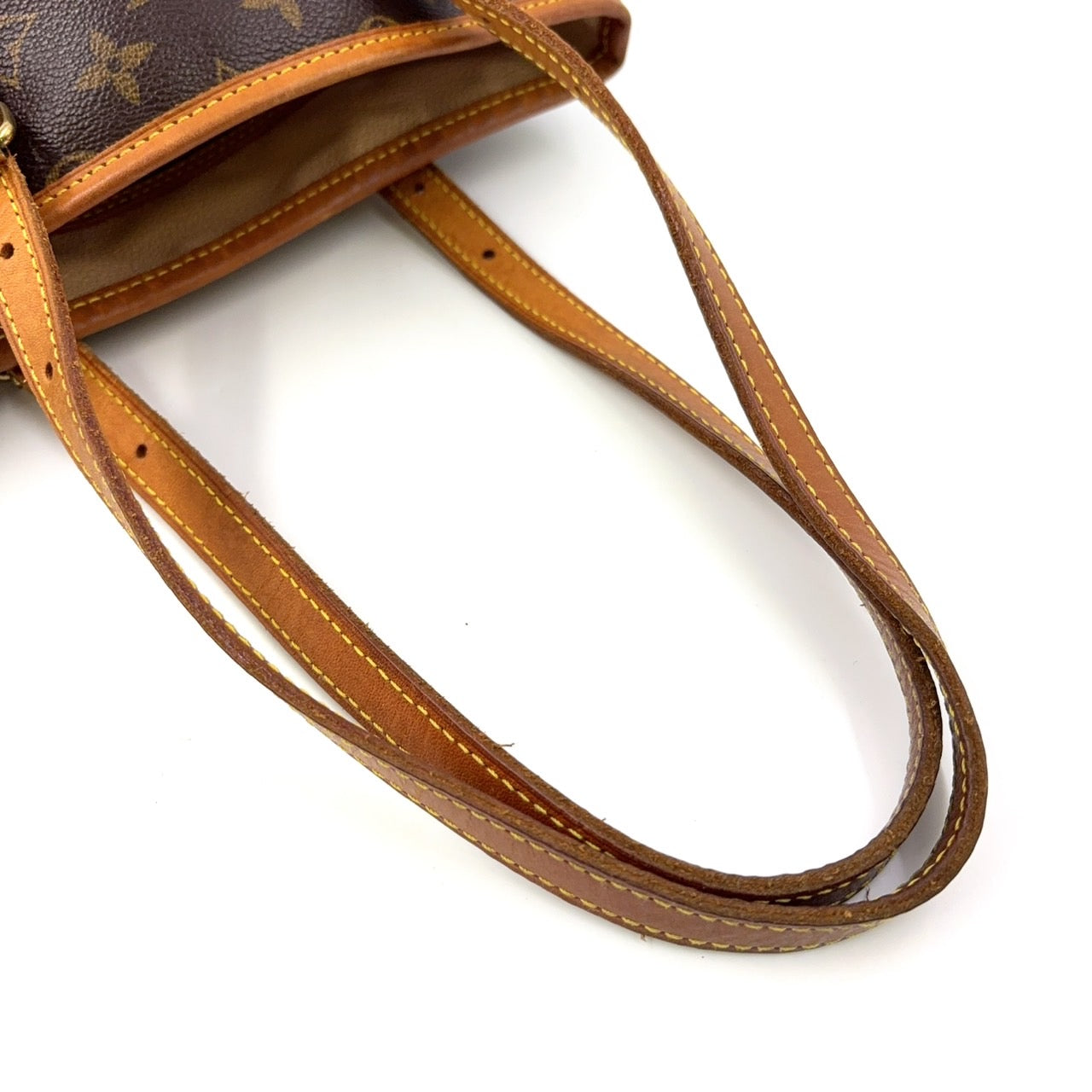 LOUIS VUITTON BUCKET BAG WITH ACCESSORIES ON CHAIN