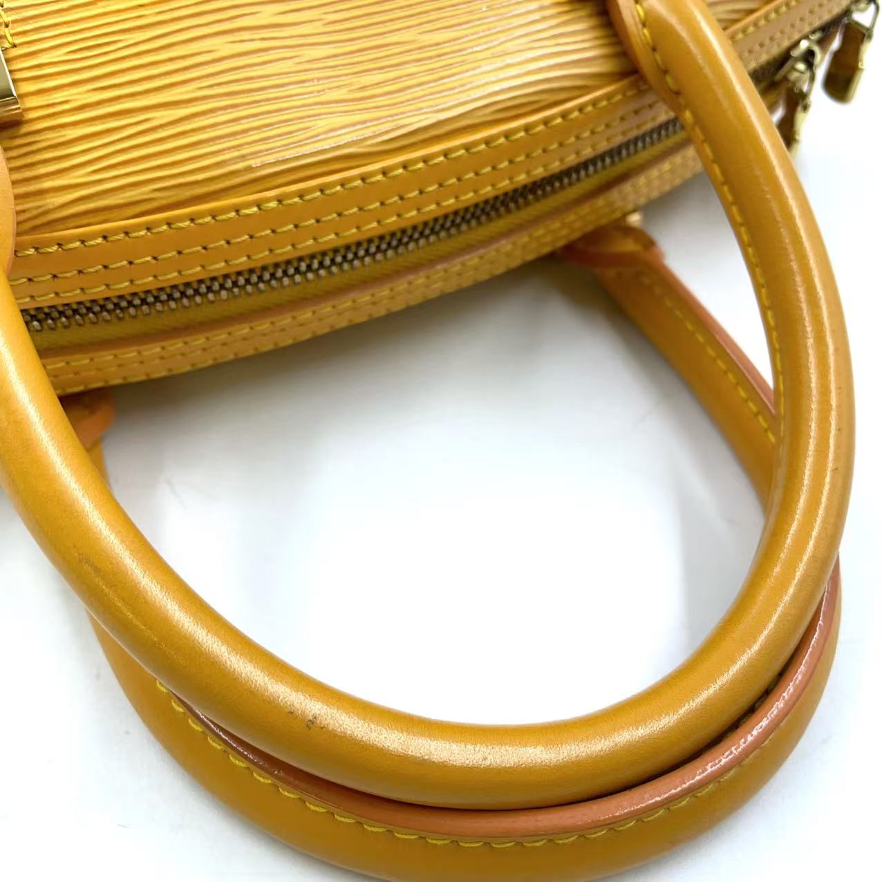 LOUIS VUITTON JASMIN TASSI YELLOW EPI LEATHER