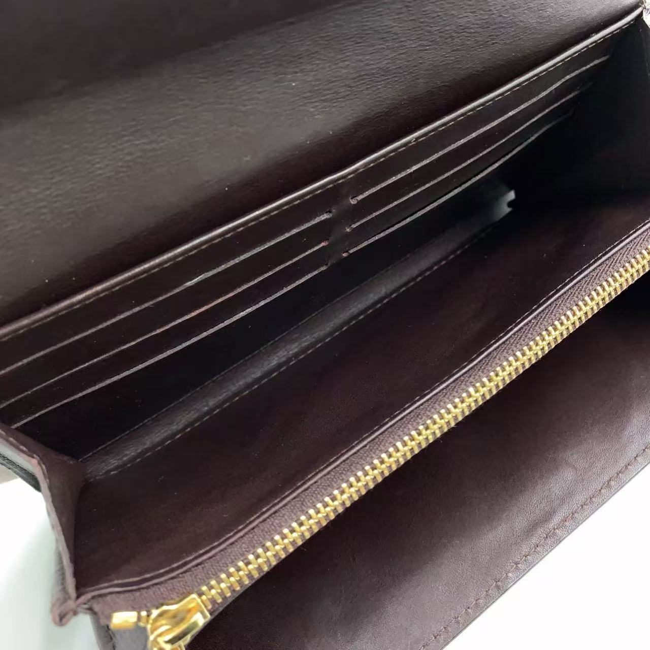 LOUIS VUITTON VERNIS SARAH WALLET IN AMARANTE